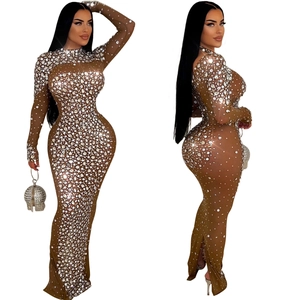 Detail view of brown mesh maxi dress featuring sparkling rhinestones and a high neckline