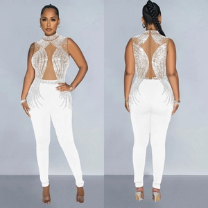 Elegant white sleeveless jumpsuit with mesh paneling and shimmering rhinestones