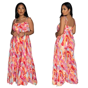 Detail view of colorful abstract print jumpsuit with thin straps and wide leg fit