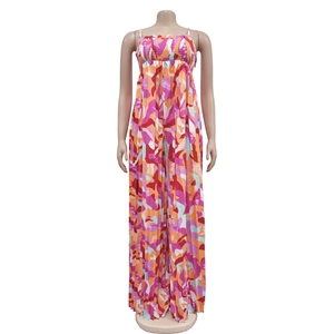 Detail of smocked elastic bodice and thin straps on abstract print wide leg jumpsuit