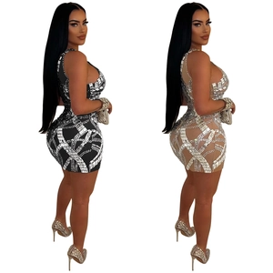 Mini abito aderente da donna con strass e mesh in nero e beige per feste