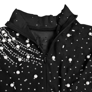 Detail of high collar with white pearls and rhinestones on black mesh dress fabric