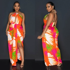 Elegant backless halter maxi dress with vibrant orange floral print and high side slit