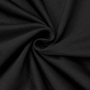 Detail of premium black knitted mesh fabric with high-density texture and matte finish