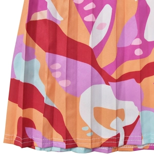 Detailed macro view of pleated fabric with vibrant abstract pop art pattern and fine stitching