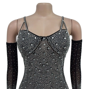 Close-up of black mesh jumpsuit with silver rhinestones and matching long gloves