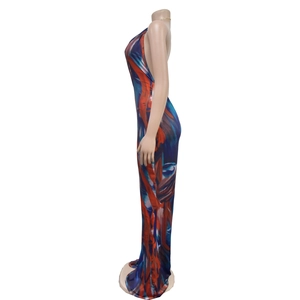 Detail of a backless floral maxi jumpsuit with colorful abstract art print and halter neck