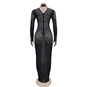 Detail view of backless V-neck mesh dress with silver rhinestones and invisible zipper