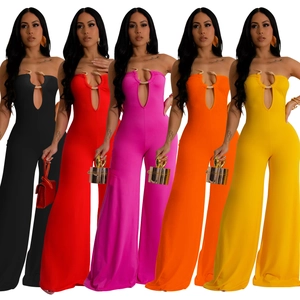 Detail view of various solid colors of the tube top jumpsuit with a gold snake buckle