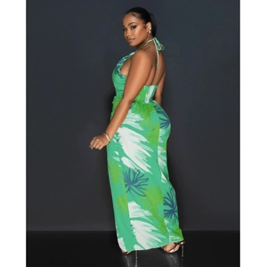 Detail of tropical palm leaf print on backless halter neck summer dress for women