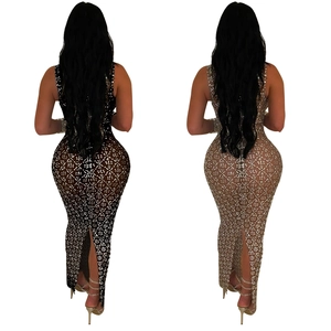 Abito lungo sexy in mesh con paillettes e schiena scoperta in nero e oro