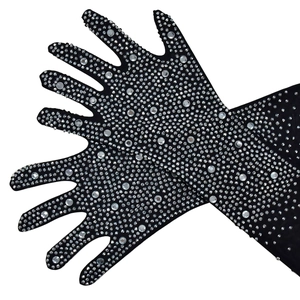Detailed view of black ceremonial long gloves with shimmering silver rhinestones