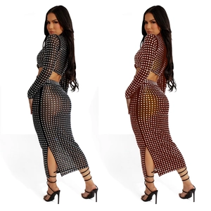 Women's two-piece sheer mesh set with rhinestones featuring crop top and side slit skirt