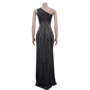 Detailed back view of a slim black one-shoulder evening dress with silver rhinestone lines