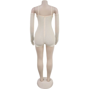 Rear view of mesh bodysuit with sparkling rhinestones and matching long gloves in beige