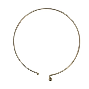 Polished gold metal choker necklace with minimalist open design and bead accents