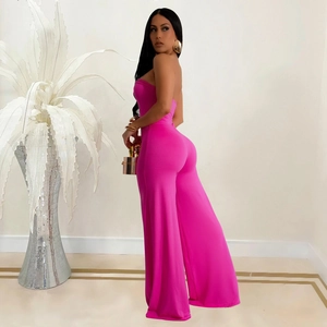 Close-up of fuchsia strapless wide-leg jumpsuit in premium stretch knit fabric