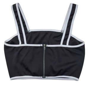 Detail of black sporty crop top with white contrast piping and back metal zipper closure