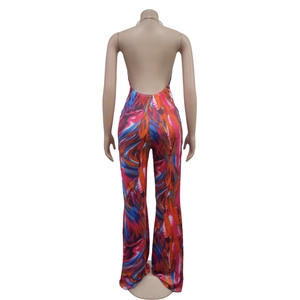 Detailed back view of sleeveless halter neck jumpsuit with colorful abstract prints