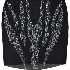 Gros plan sur maille noire transparente avec motifs de flammes en strass argentés