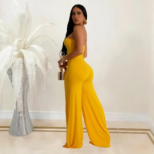 Detail of bright yellow strapless wide-leg jumpsuit with high-elastic knit fabric