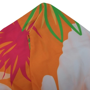Detail of the high-quality stitching and hidden zipper on the tropical floral maxi dress