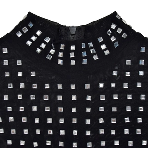 Close-up of black mesh high collar with square rhinestones and rear metal zipper detail