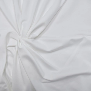 Detailed close-up showing the fine texture and drape of the white elastic dress fabric