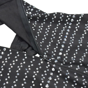 Detail of silver rhinestones on black evening dress with concealed zipper closure