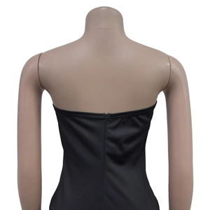 Close-up of the back detail featuring a hidden zipper on a black strapless jumpsuit