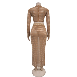 Detail view of the sheer mesh fabric and sparkling silver rhinestones on the back of dress