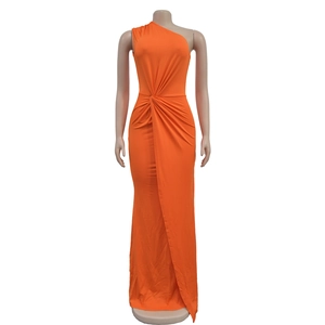 Detail of orange one-shoulder evening gown featuring waist knot and ruched slim fit