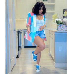 Women's color block blazer jacket in blue and pink with casual denim shorts outfit