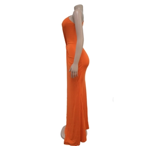 Side view of vibrant orange maxi dress highlighting slim fit waist ruching detail