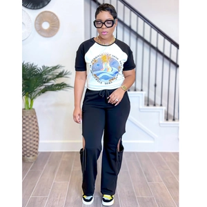 Women's 2-piece lounge set featuring a sun print raglan tee and cutout joggers
