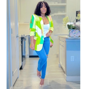 Fashionable women's long-sleeve blazer featuring bright green and yellow floral print patterns