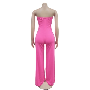 Close-up of bright pink tube jumpsuit featuring a seamless back hidden zipper closure