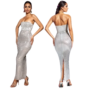 Detail view of silver sequin bodycon maxi dress with back zipper and split hemline