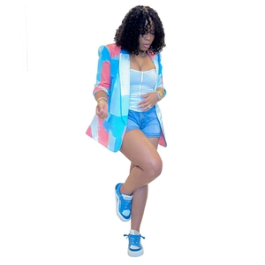 Detail of artistic abstract print on a women's long sleeve fashion blazer with vibrant colors