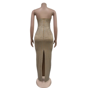 Detailed back view of a sleeveless bodycon maxi dress with silver sequins and high slit