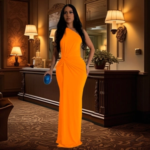Detail of waist pleated design on bright orange one-shoulder slim fit evening gown