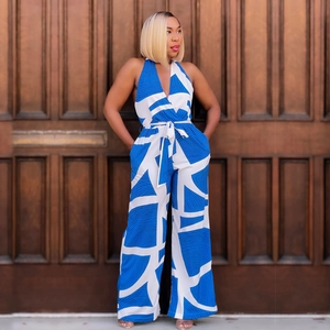 Women's V-neck halter jumpsuit with blue geometric print, high waist and wide leg design