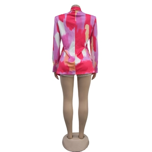 Back view of a women's blazer with vibrant pink and purple abstract art printing