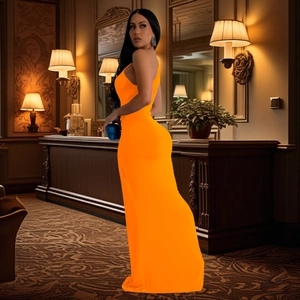 Detailed back view of a slim fit one shoulder orange evening maxi dress with elegant drape