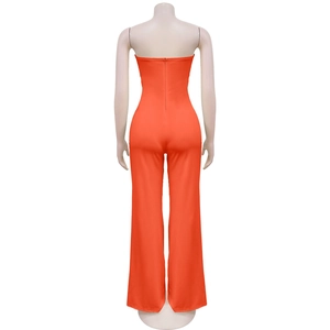 Rear view of bright orange strapless jumpsuit with back zipper and wide leg design