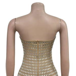 Detail of the hidden zipper and silver rectangular sequins on the champagne gold dress