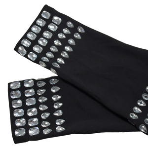 Detail of elegant black rhinestone sleeves with sparkling crystal embellishments