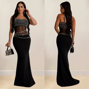 Elegant black fisheye evening dress with silver rhinestones and mesh patchwork details