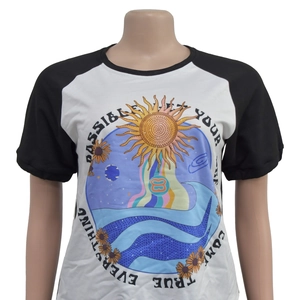 Detail of crew neck T-shirt featuring colorful sun and sunflower graphic print design