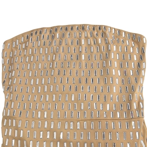 Detail of khaki strapless dress featuring rows of shimmering rectangular rhinestones